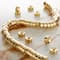 12 Pack: Gold Metal Interlock Beads by Bead Landing™